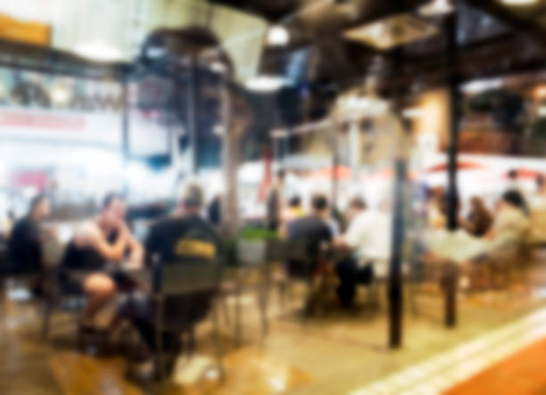 istock Blurred scene in cafe coffee with social foreigners 1130936695