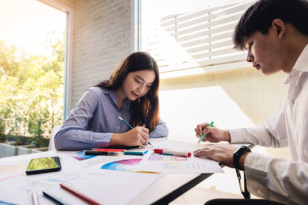 istock Graphic designer creative meeting share ideas colour for design graphics for new web in workplace. 1130938392