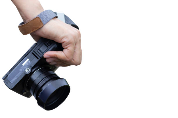 istock Woman hand holding digital camera isolated on white blackground with copy space. 1130938568