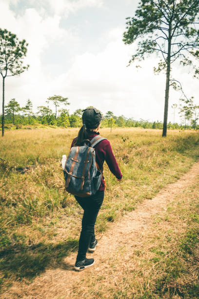 istock Woman Walking On Field Against Sky 1130938697