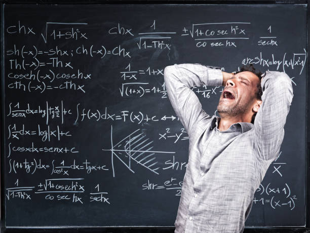 istock Teacher Screaming While Standing Against Blackboard In Classroom 1130939382