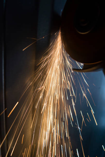 istock Sparks when cutting metal with a grinder, there is free space for filling 1130940063