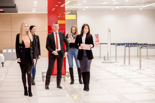 istock Group of business people in office lobby 1130945280