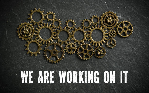 istock many cogwheels symbolizing a complex machine and the message 