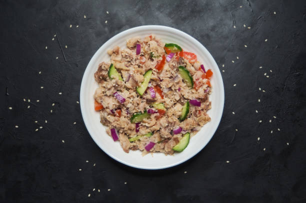 istock Thai Tuna Salad on the black table. Top view. 1130946891