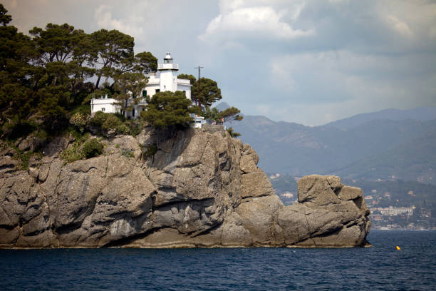 The Portofino Lighthouse overlooking the sea can only be reached reached by hiking, but offers an outdoor cocktail bar with sweeping ocean views when you get there.
