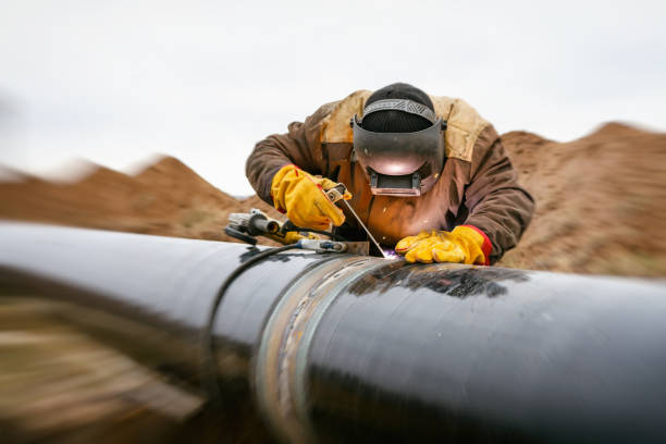 istock Welding works on gas pipeline 1130949180