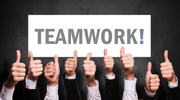 many thumbs up to "teamwork" - thumbs up business occupation competition imagens e fotografias de stock