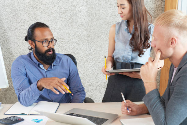 istock Businessman sharing idea with colleague 1130953025