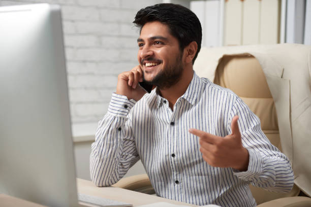 istock Excited entrepreneur talking on phone 1130953541