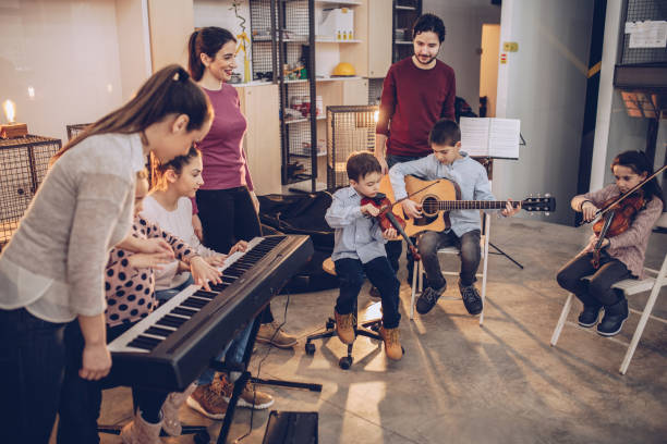 istock Work day in kids music school 1130956474