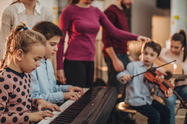 istock Kids in music school 1130956622