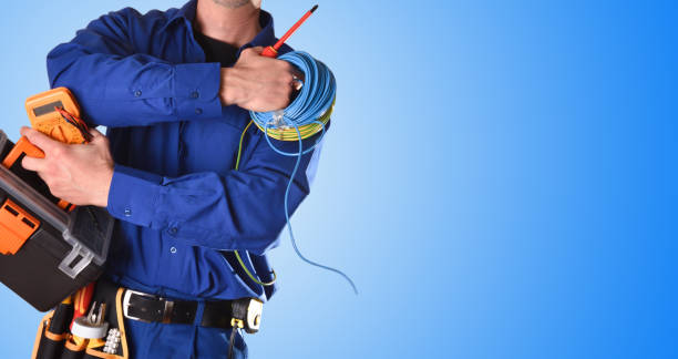 istock Electrician with tools and electrical equipment isolated blue detail 1130957264
