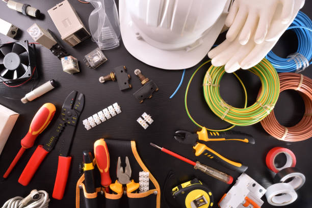 istock Industrial electricity tools on black table close up top 1130957659