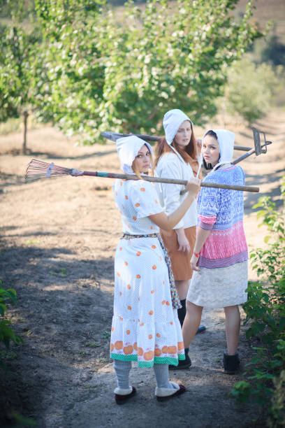 istock Three women working in her vegetable garden. 1130962028