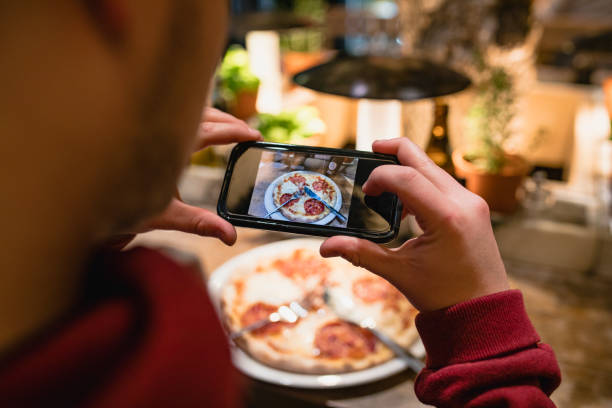 istock Photographing His Food 1130963804