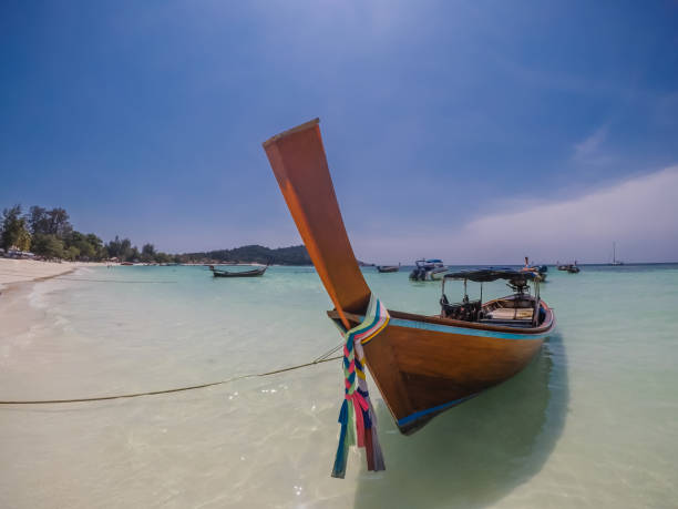 istock Thailand - Boat at the beach 1130964018
