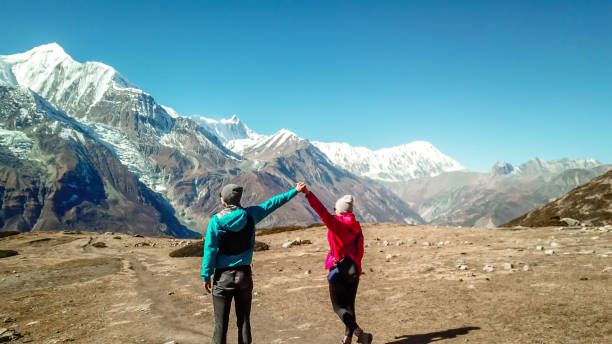 istock Nepal - Couple and the view on Annapurna ChainNepal 1130964200