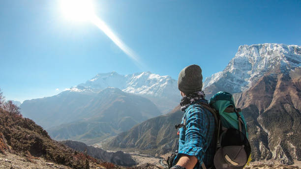 istock Nepal - Young Man Admiring Annapurna Chain 1130966173