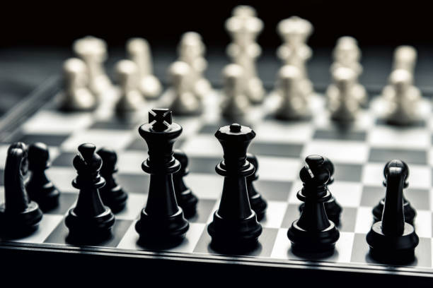 Chess board with black and white chess facing each other
