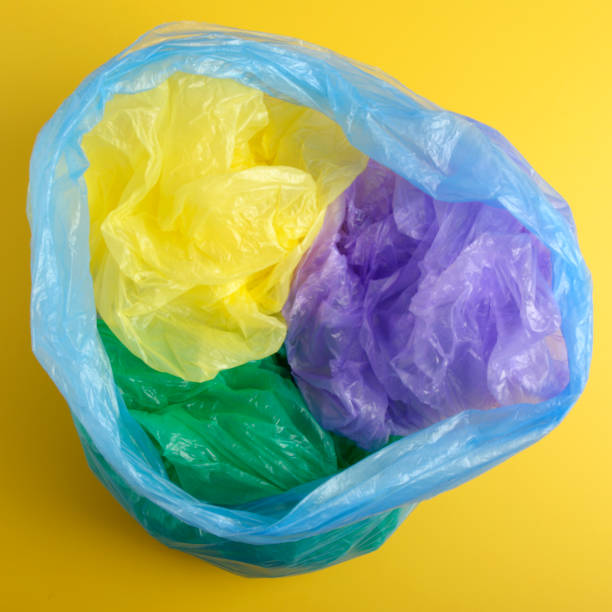 istock Plastic Bags isolated on yellow background. Flat lay 1130967874