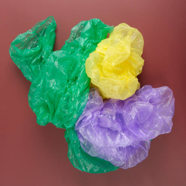 istock bag garbage. Trash, Garbage, Rubbish, Plastic Bags isolated on red background 1130967938