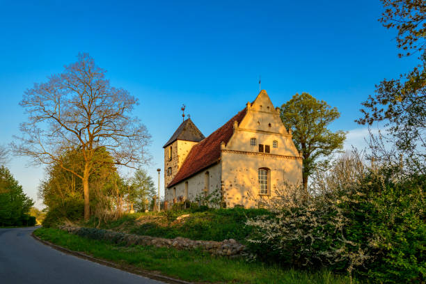 East front of the listed historical village church Rambow in early morning light additional keywords: müritz, mecklenburgische schweiz, mecklenburg switzerland, moltzow, rambow, morning light muritz national park photos stock pictures, royalty-free photos & images