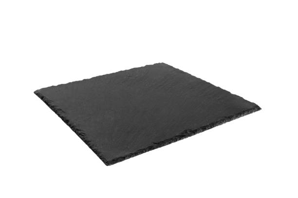 istock Empty black square slate plate isolated on white background. slate board isolated 1130968260
