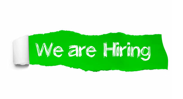 istock We're Hiring written under torn paper. Human resource concept. Concept Image 1130969161