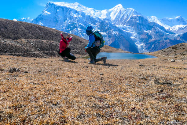 istock Nepal - Couple at the Ice lake 1130969907
