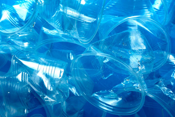 istock Plastic glass used for drinking water on blue background 1130973872