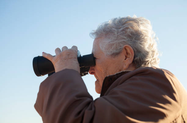 istock Senior woman Birdwatching 1130976507