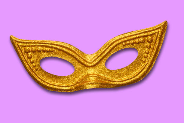 istock Gold Mardi Gras Mask On Purple Background 1130978135
