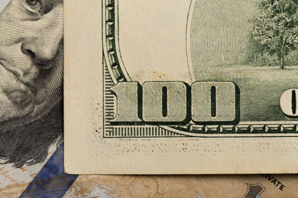 istock US hundred  Dollar elements , super macro, close up photo 1130979338