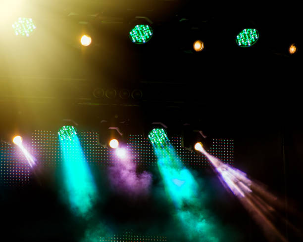 istock Stage lighting during a show on a dark background during a concert. 1130982551