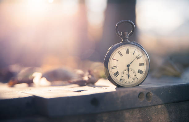 istock Hand held stop watch outdoors, autumn, blurry background 1130982553
