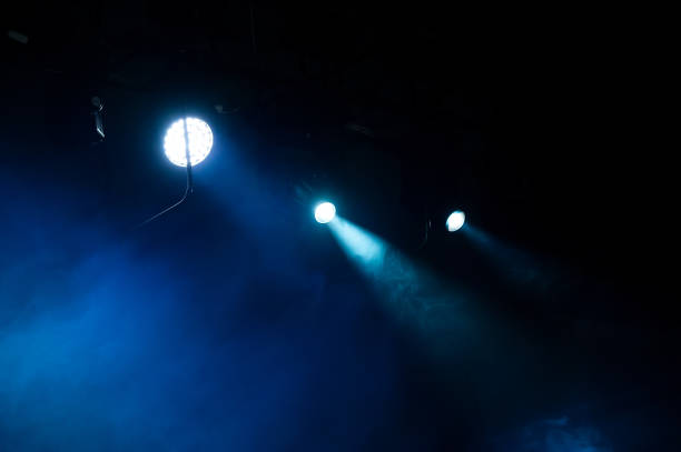 istock Theater stage lighting in a haze during the performance. 1130982588