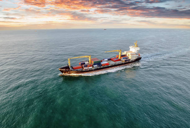 istock Aerial view of a cargo ship at dawn 1130982880