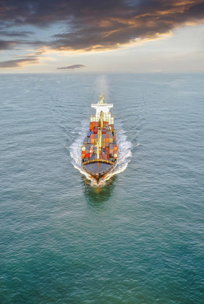 istock Aerial view of a cargo ship at dawn 1130982936