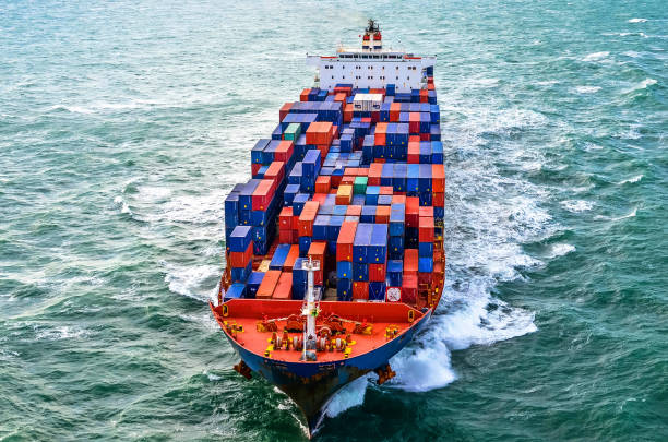 istock Aerial view of a cargo ship at dawn 1130985043