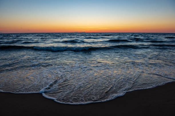 istock colorful sunset on the sea beach in summer 1130987345