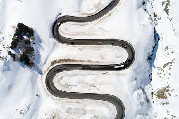istock Traffic on Winding Alpine Road, Aerial View 1130992671