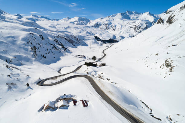 istock Mountain Winter Landsccape with Winding Road From Above 1130992769