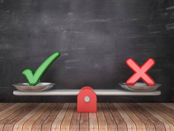 istock Seesaw Scale with Check and Cross Symbols on Chalkboard Background - 3D Rendering 1130992950