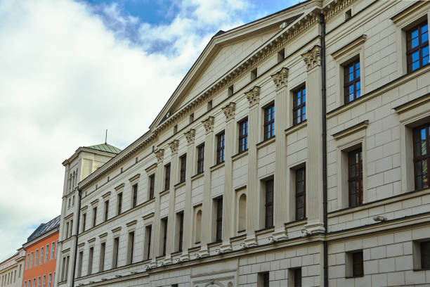 istock Facade of the building in the neoclassical style with a portico crowned with a triangular tympanum 1130993793