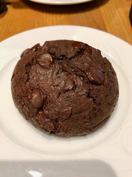istock Big Chocolate Cookie with Peanut served with Plate. 1130996277