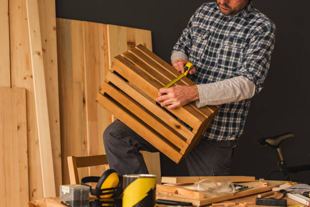 istock Carpenter making wooden crate in small business woodwork workshop 1130996669