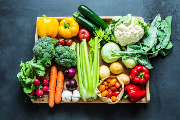 istock Fresh colorful spring organic vegetables on black 1131005367