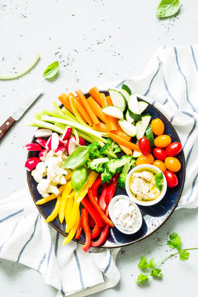 istock Vegetarian snacks plate -  colorful vegetables and dips 1131005376
