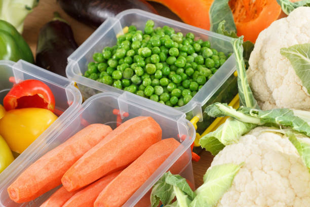 istock Trays with raw vegetables for freezing. 1131009208